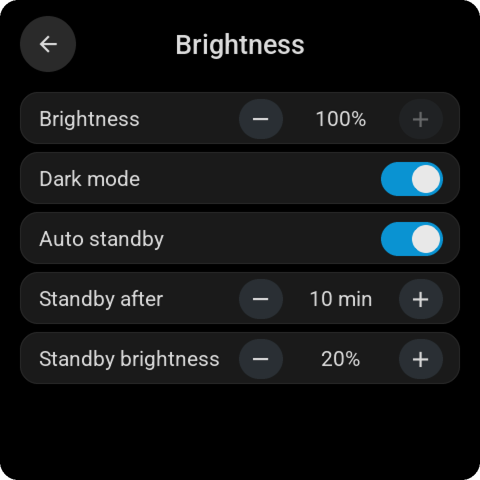 The same Brightness page right after turning Dark mode on: a black page with graphite rows and soft white text