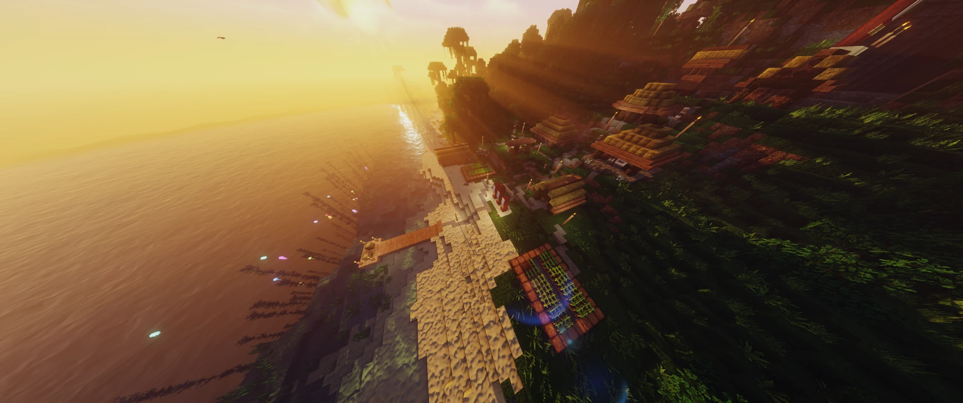 A hut village on a jungle island at golden hour