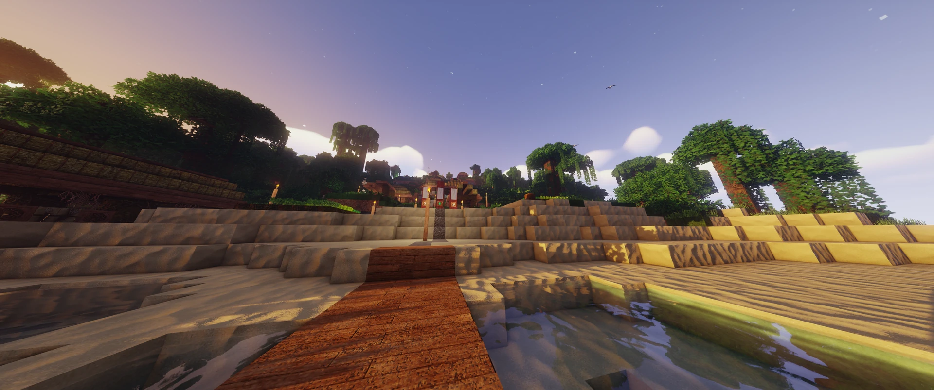 A houseboat at a village dock at dusk