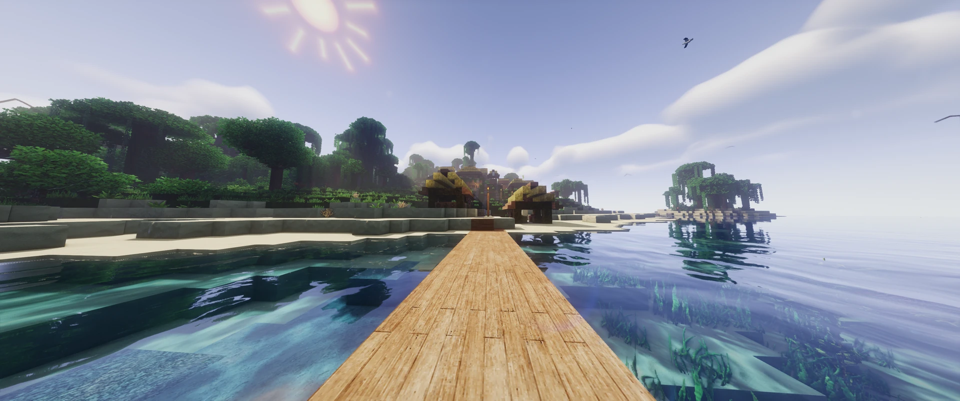 A dock over turquoise shallows