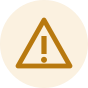 The elevated-credential badge: a warning triangle on a cream circle