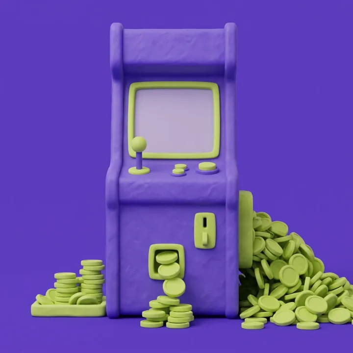 A clay arcade cabinet spilling lime coins