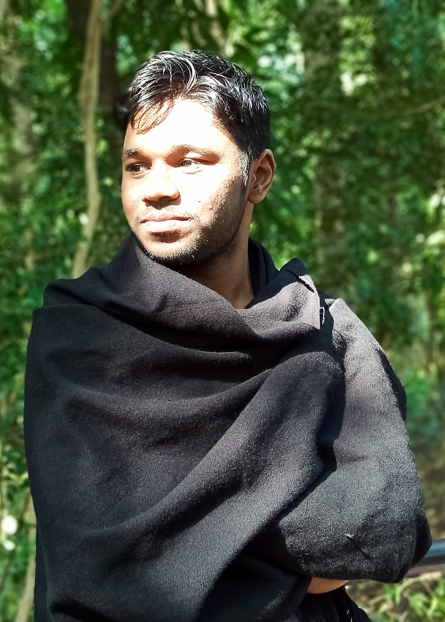 Professional portrait of Bijoy Mitra