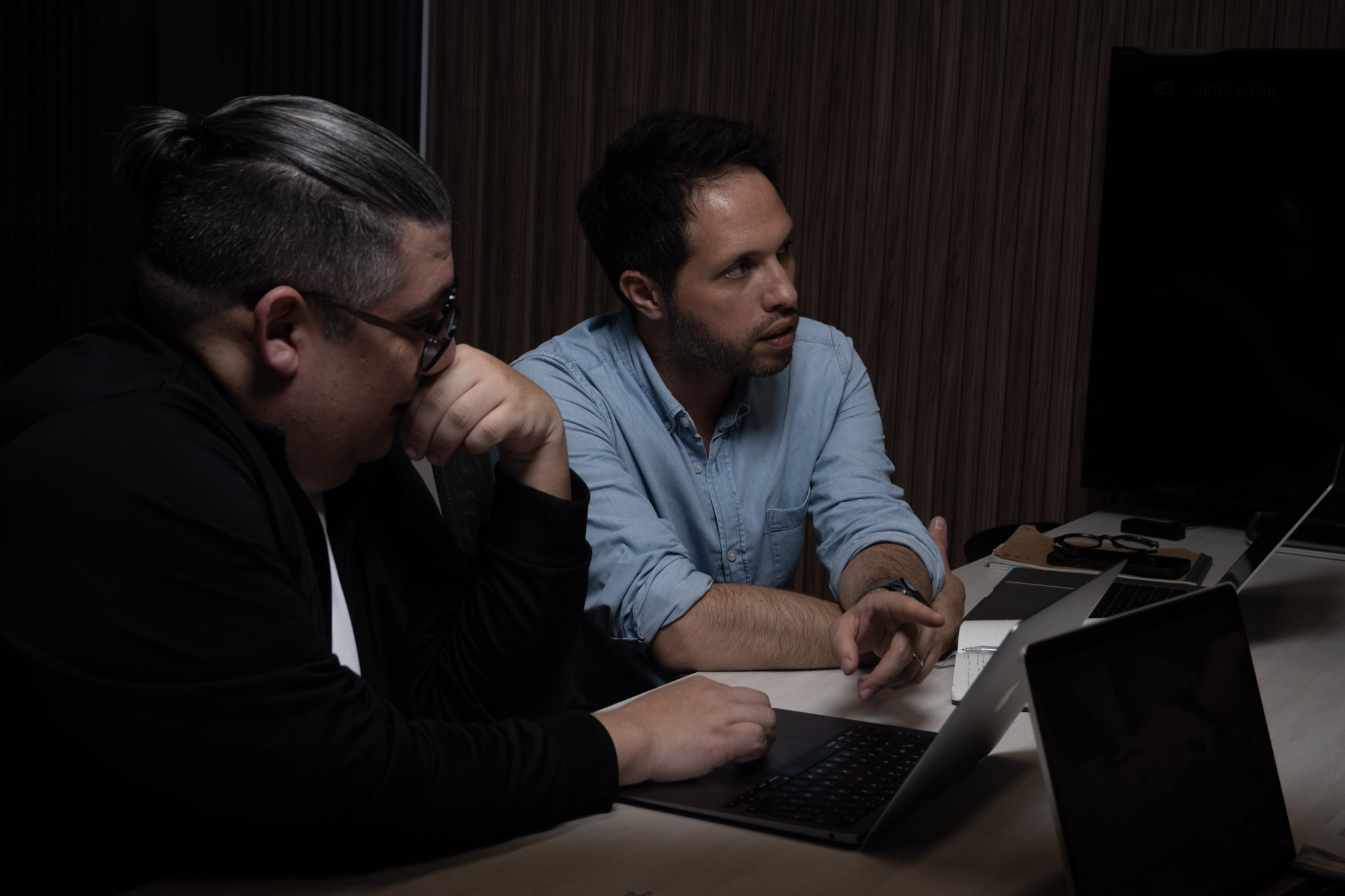 NLACE team collaborating with a laptop