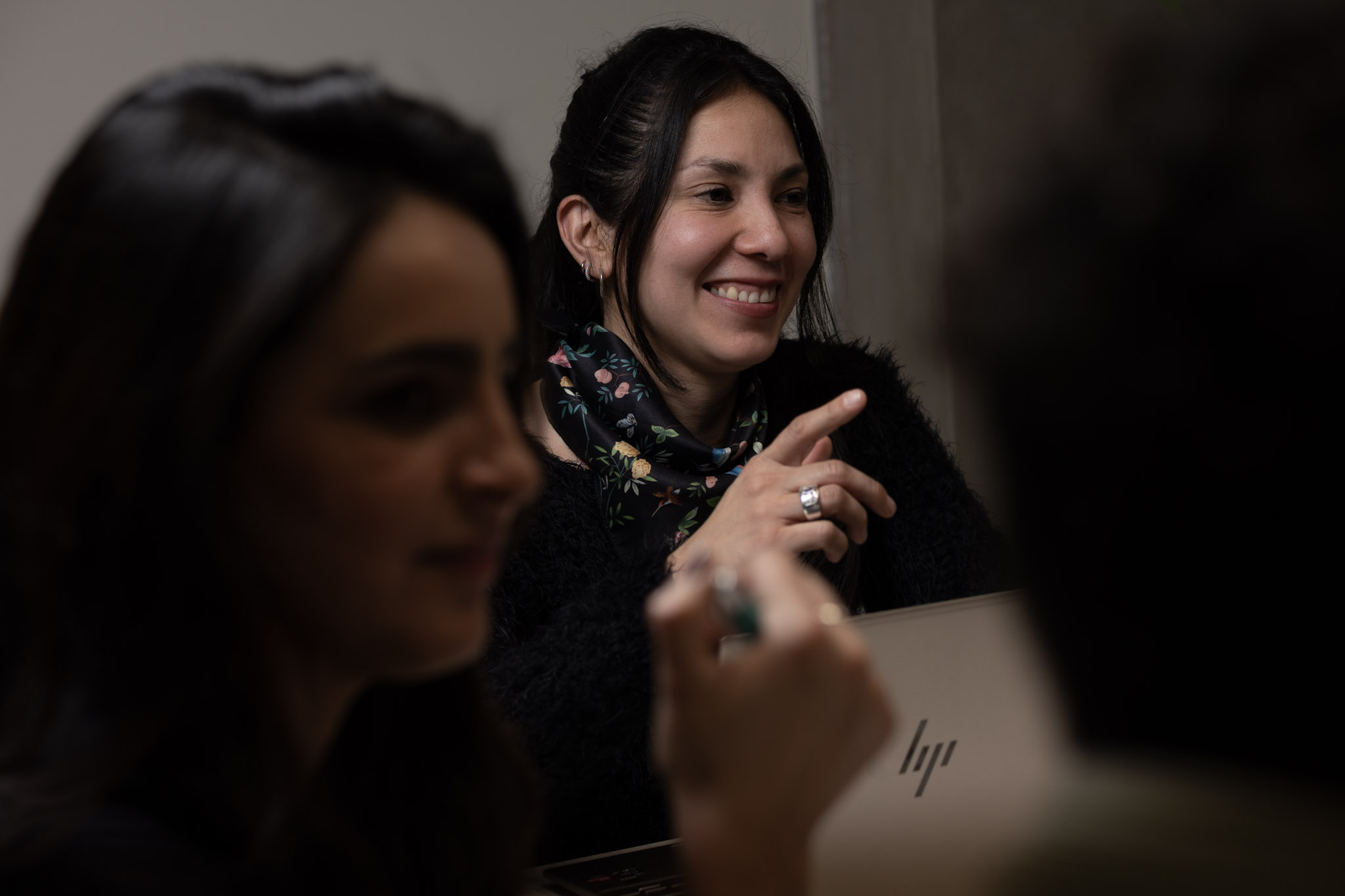 Two NLACE team members collaborating