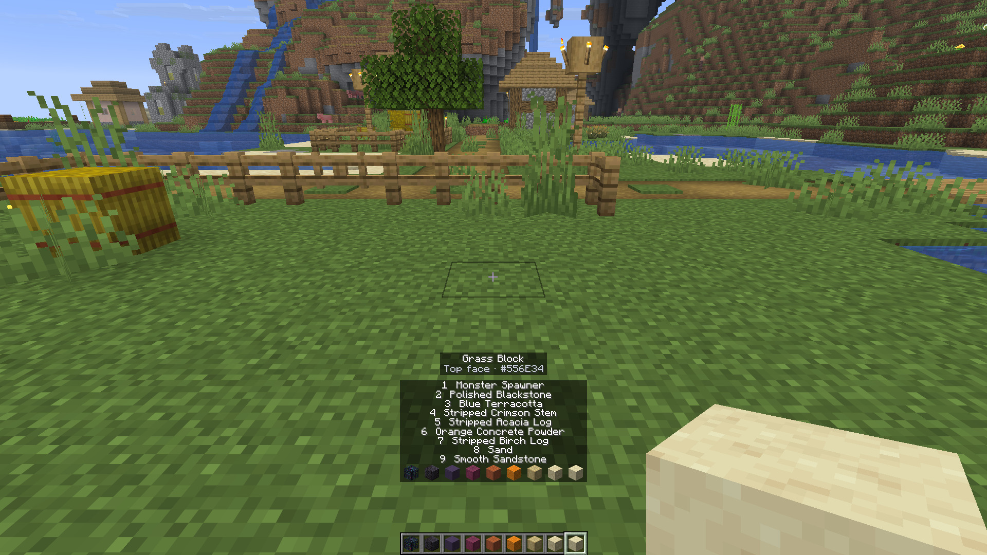 A grass block's sampled top colour and the hotbar labels.