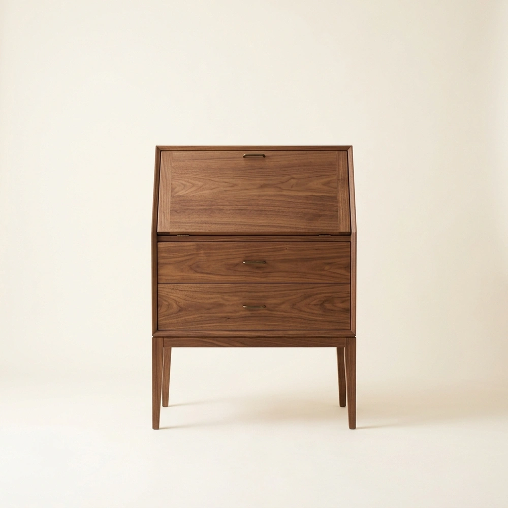 An antique slant-front secretary desk in oak.