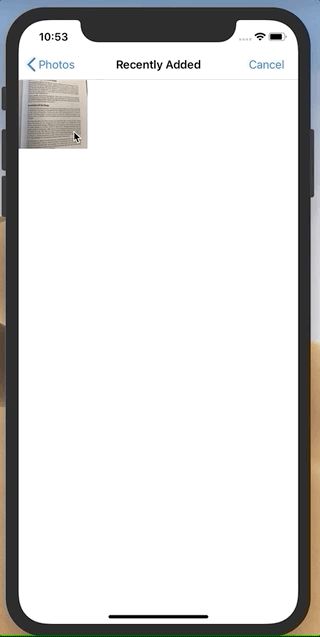 An animated gif of the app showing the gallery button being pressed, a photo of a book page being picked, an "Analyzing" notification, and ending with the immersive reader showing that book's text