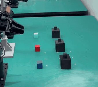Real-robot Cover Blocks, layout GRB: green, red, blue from far to near