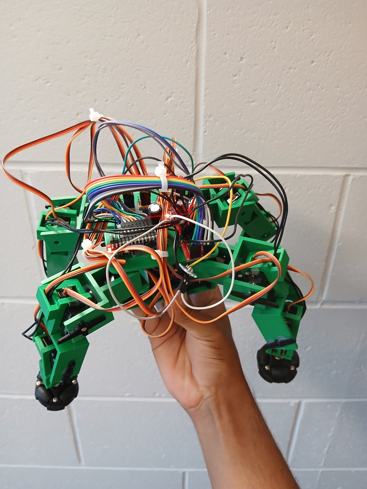 Current green hybrid robot held upright