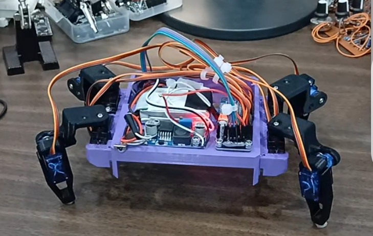 V1 earlier purple four-legged robot