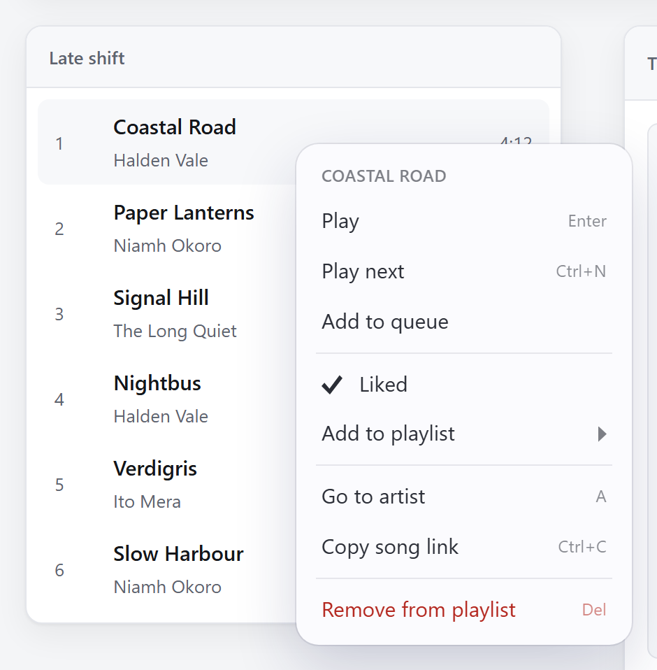 A context menu with 16px rounded corners, generous padding and a system font, over a track listing.
