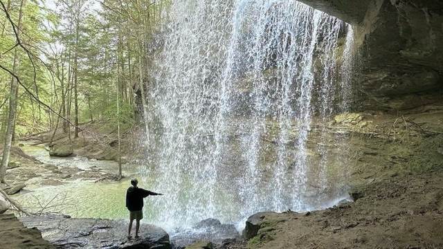 Patience beneath a waterfall