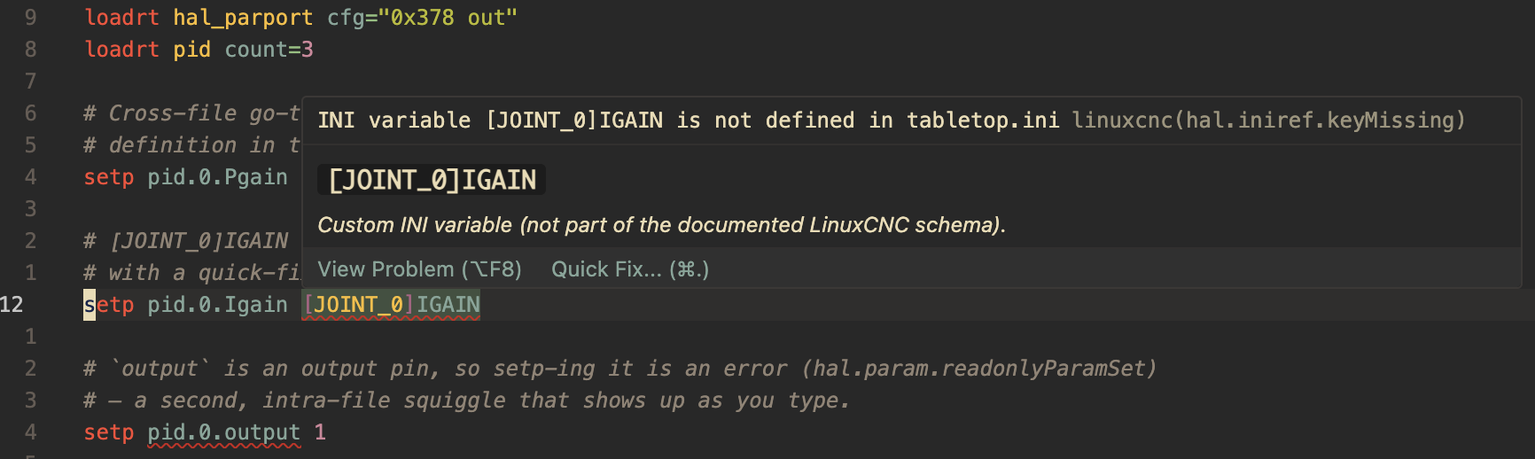 A HAL file with a red squiggle under an INI reference that is not defined, and a hover tooltip explaining the error.