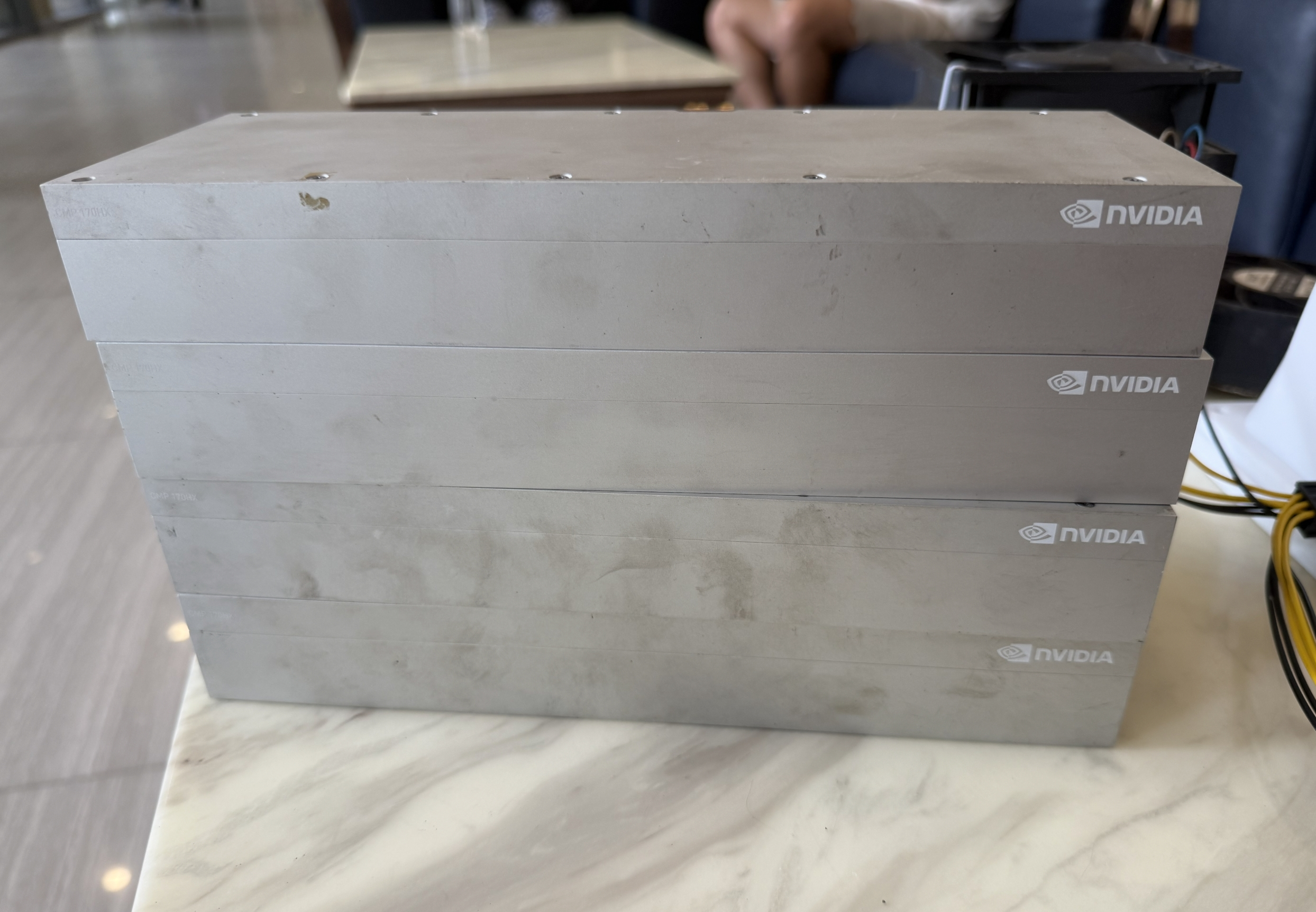 Four passively cooled CMP 170HX cards before installation
