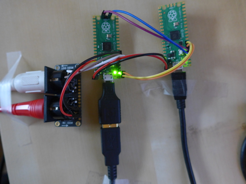 Pico USB MIDI Host Adapter with picoprobe on the right