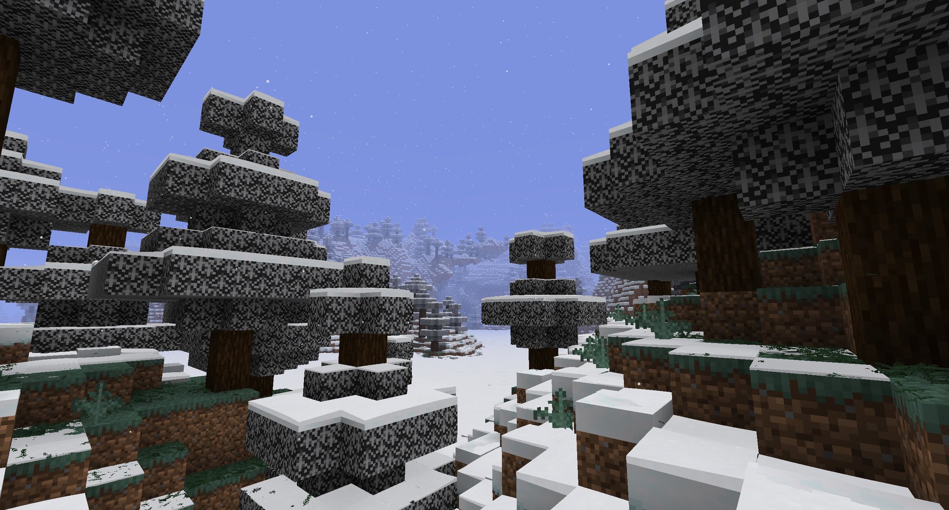 Light snow under a clear winter sky