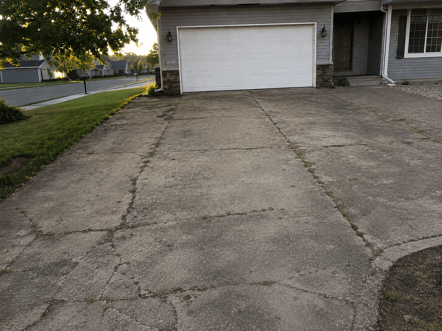 Before: cracked driveway