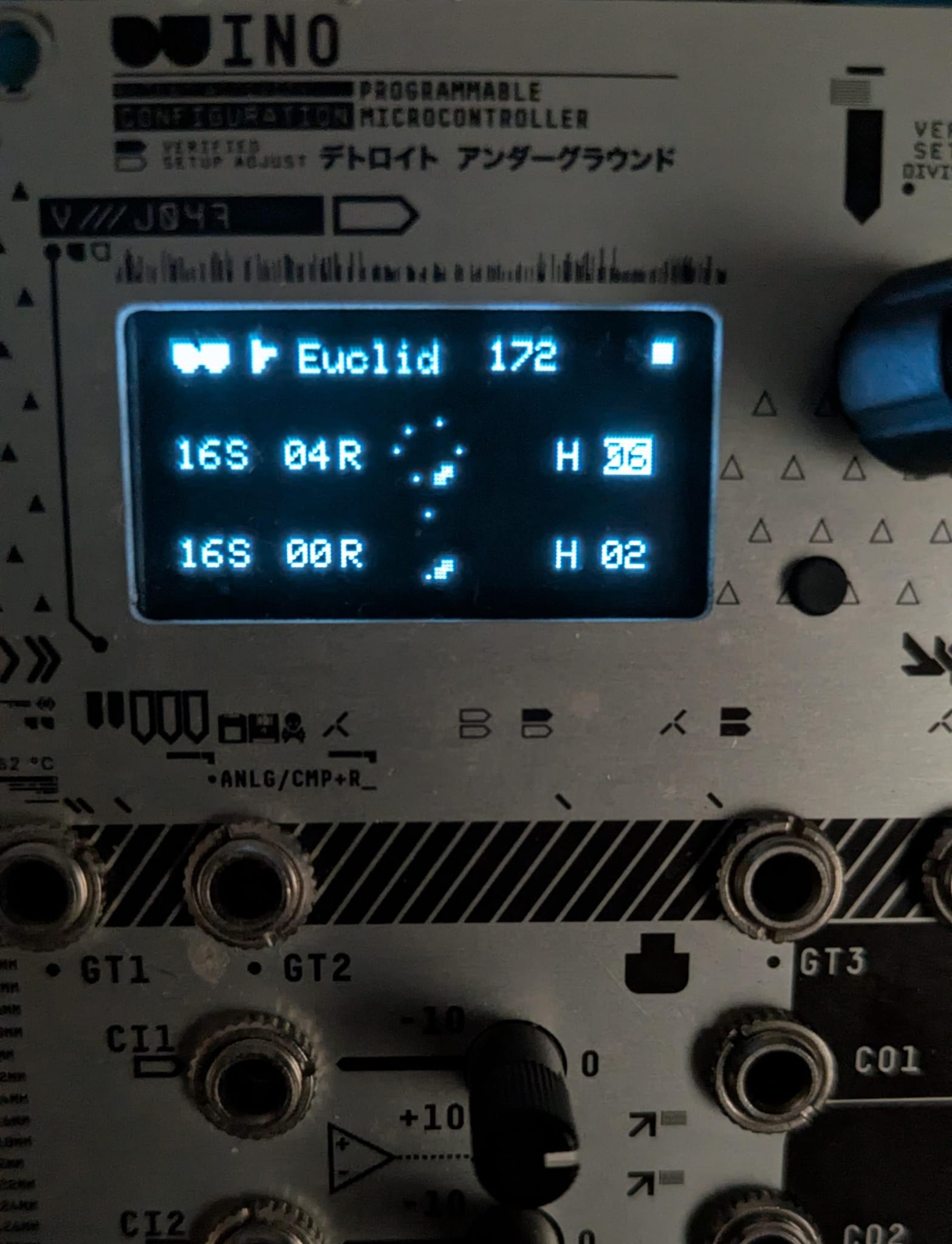 DU-INO front panel with its OLED display showing the Euclid function, two rows of step and hit settings with small circular pattern graphics