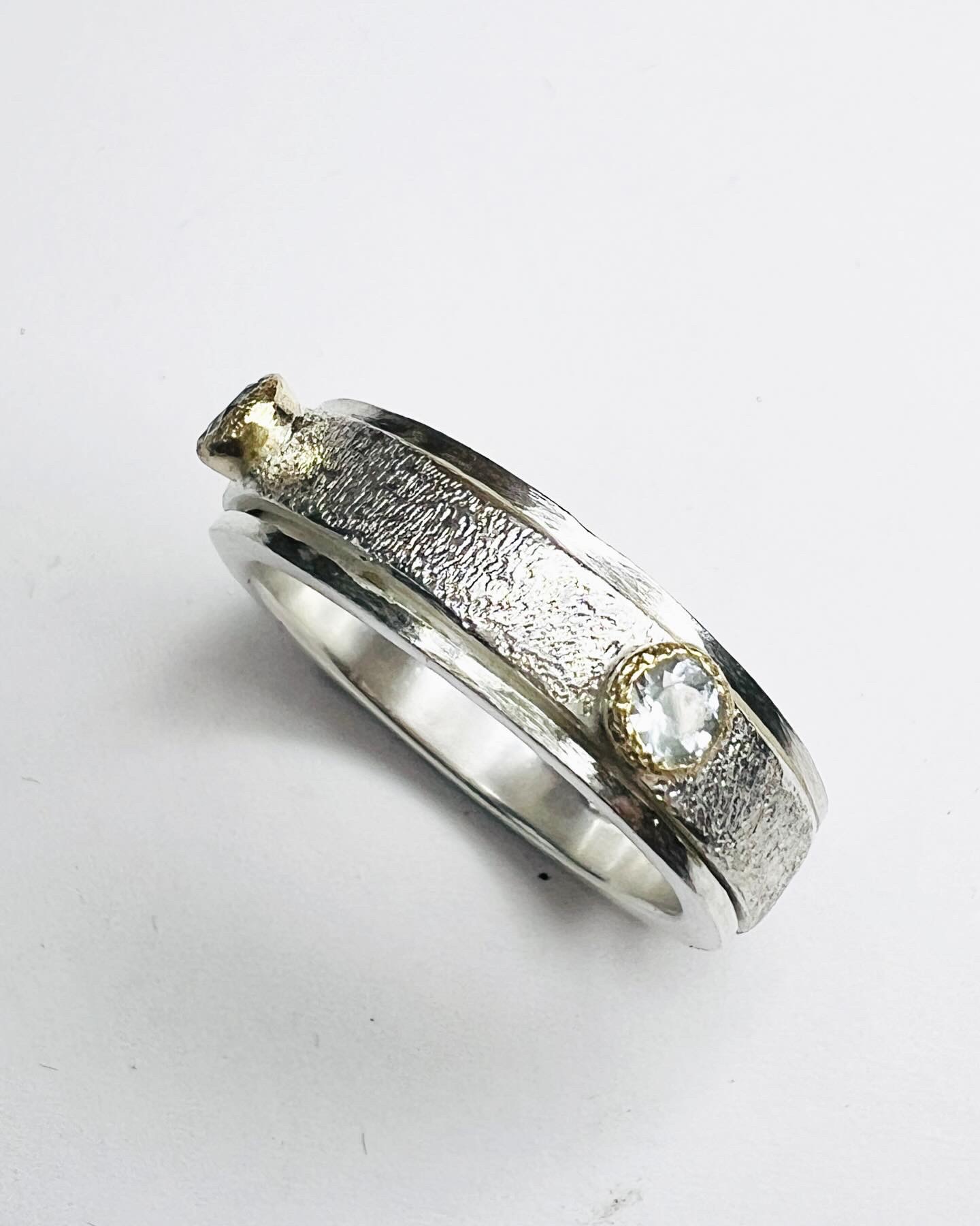 Silver and gold ring