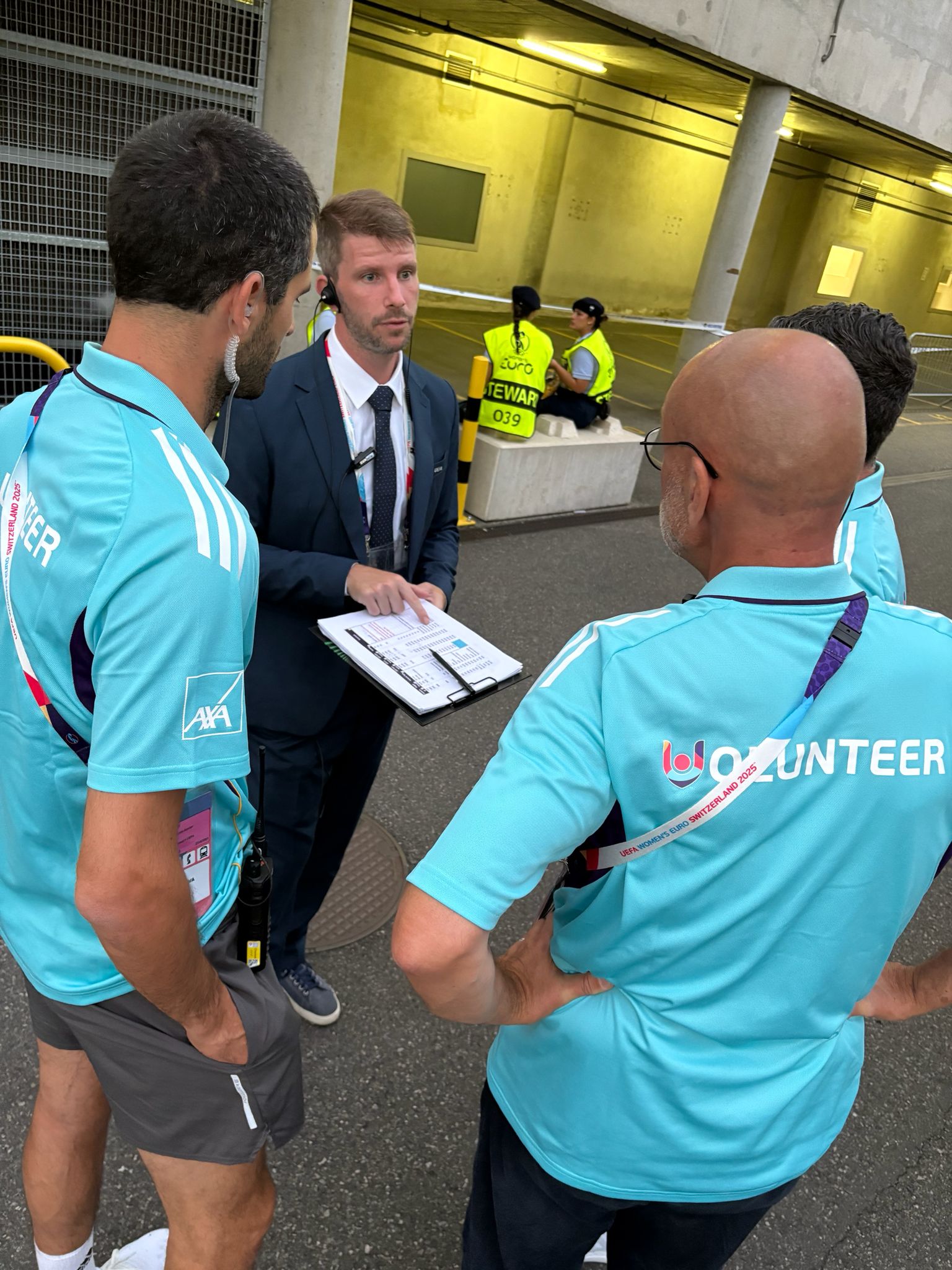 Thyr Rodrigues briefing event volunteers at UEFA Women's EURO 2025