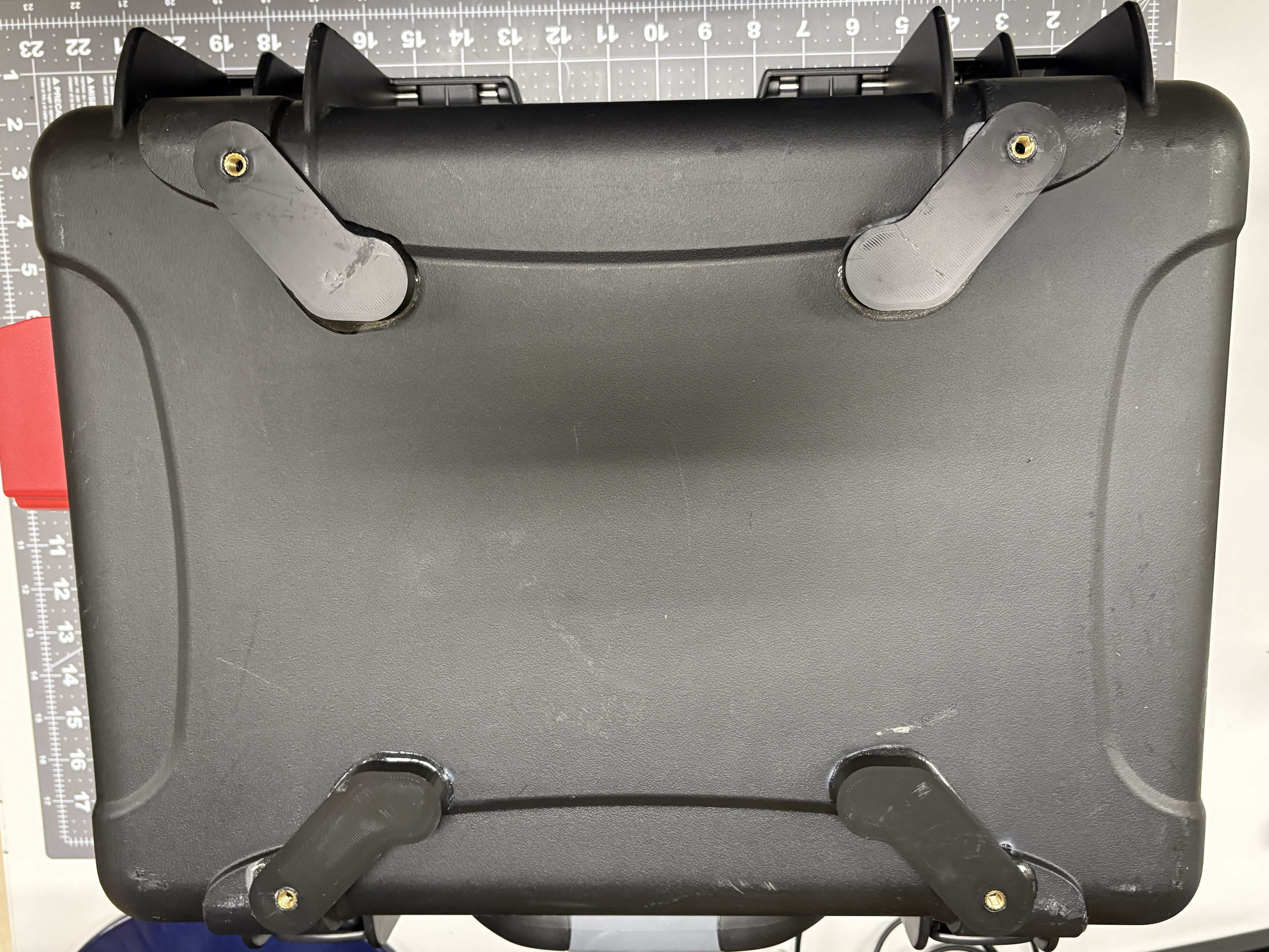 Primary brackets epoxied to the bottom of the case.