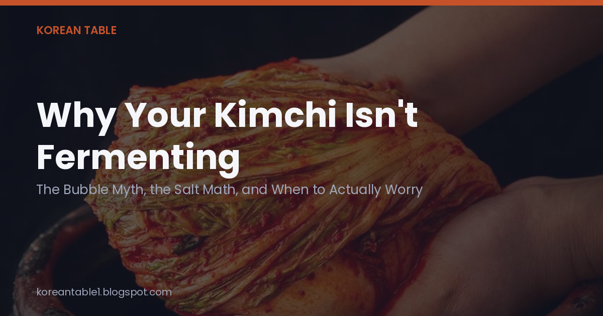 Opening card over a photo of paste-coated napa cabbage being packed into a traditional onggi crock, reading "Why Your Kimchi Isn't Fermenting"