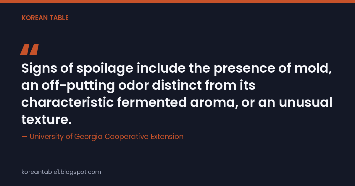 Quote card citing the University of Georgia Cooperative Extension on the actual signs of kimchi spoilage