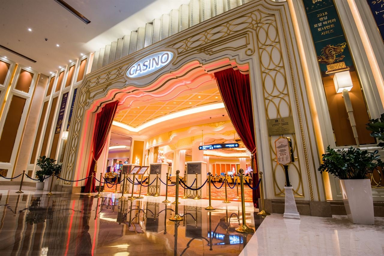 The gold-trimmed entrance to Landing Casino inside Jeju Shinhwa World, roped off behind red velvet curtains