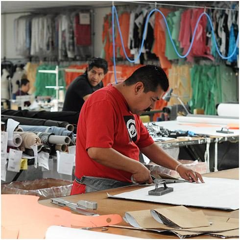 Pattern maker developing a technical garment template