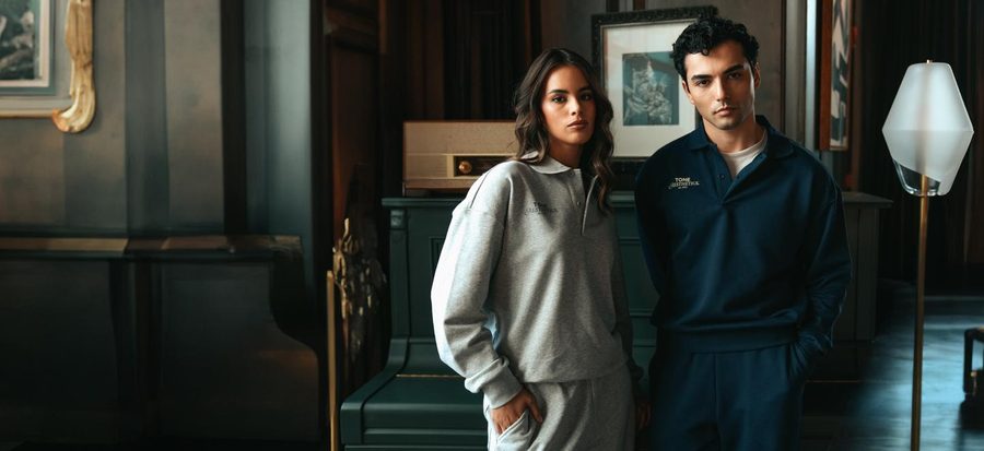 Dark tracksuit set produced through cut and sew manufacturing