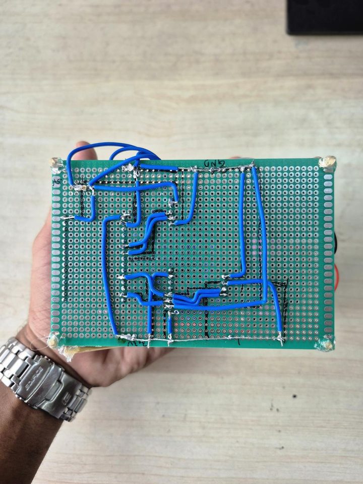 Hand-soldered wiring on the underside of the sensor deck
