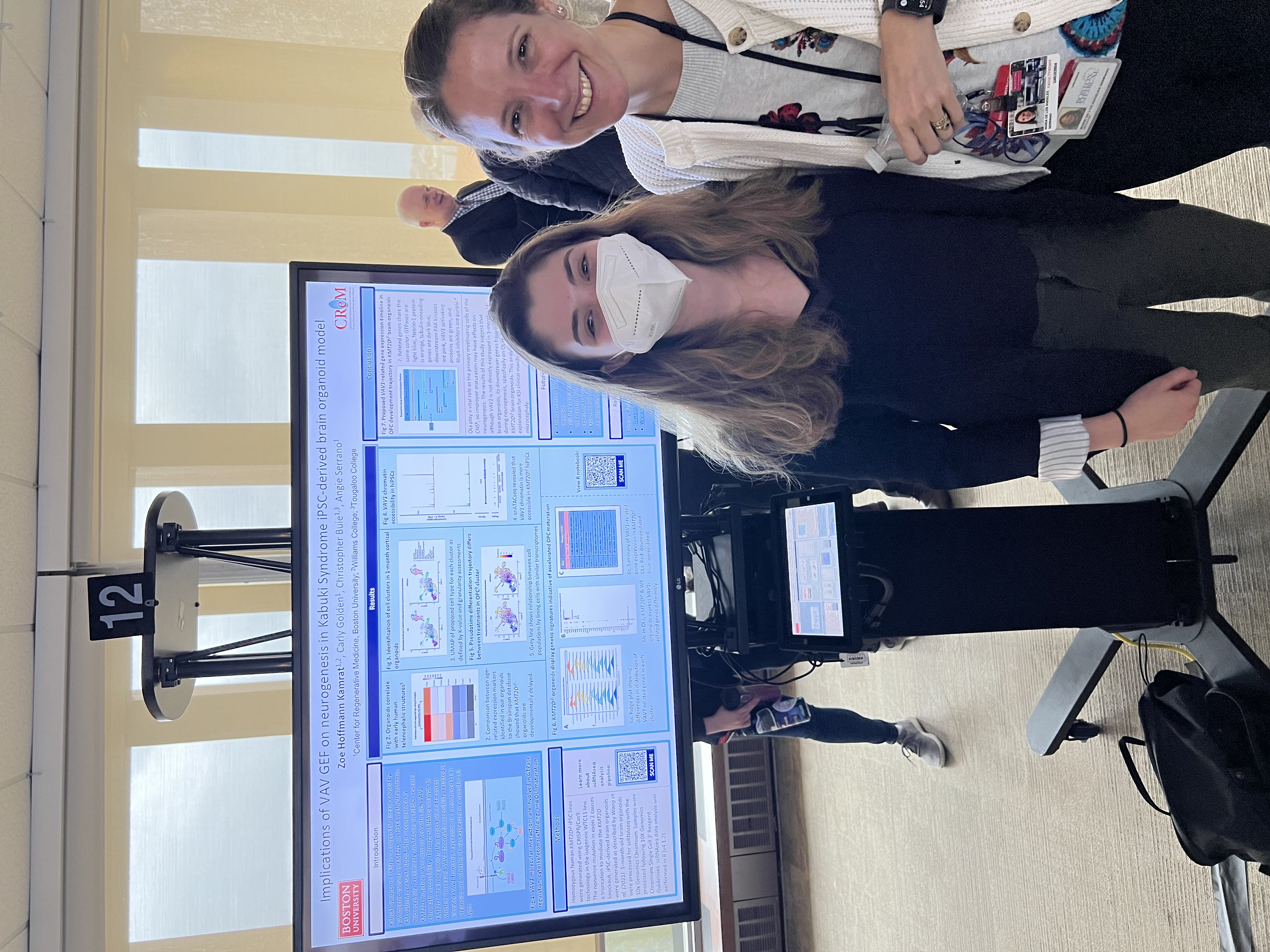 Zoe presenting a research poster at Evans Day