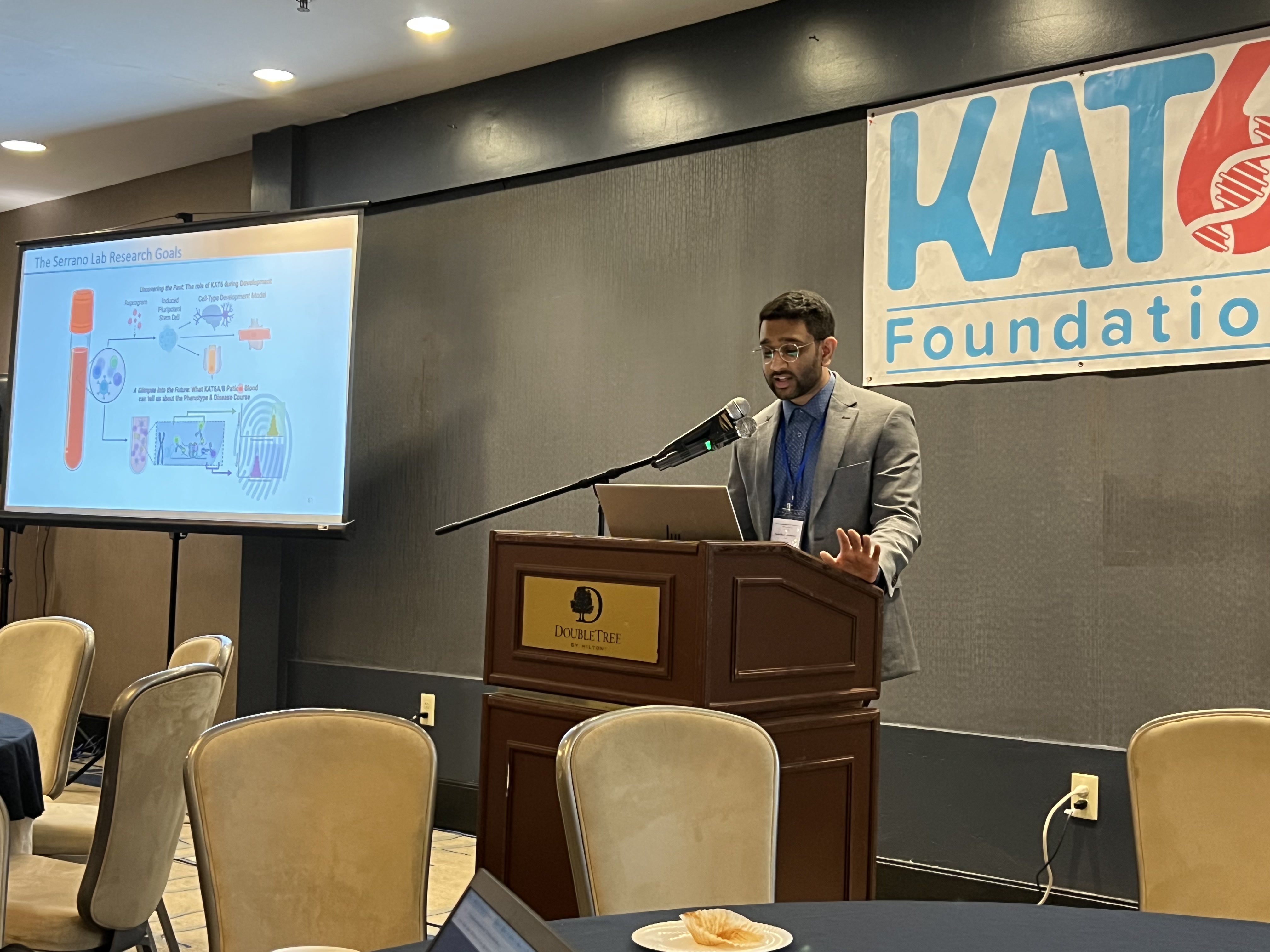 Sandeep at the podium representing the lab at the International KAT6 Conference