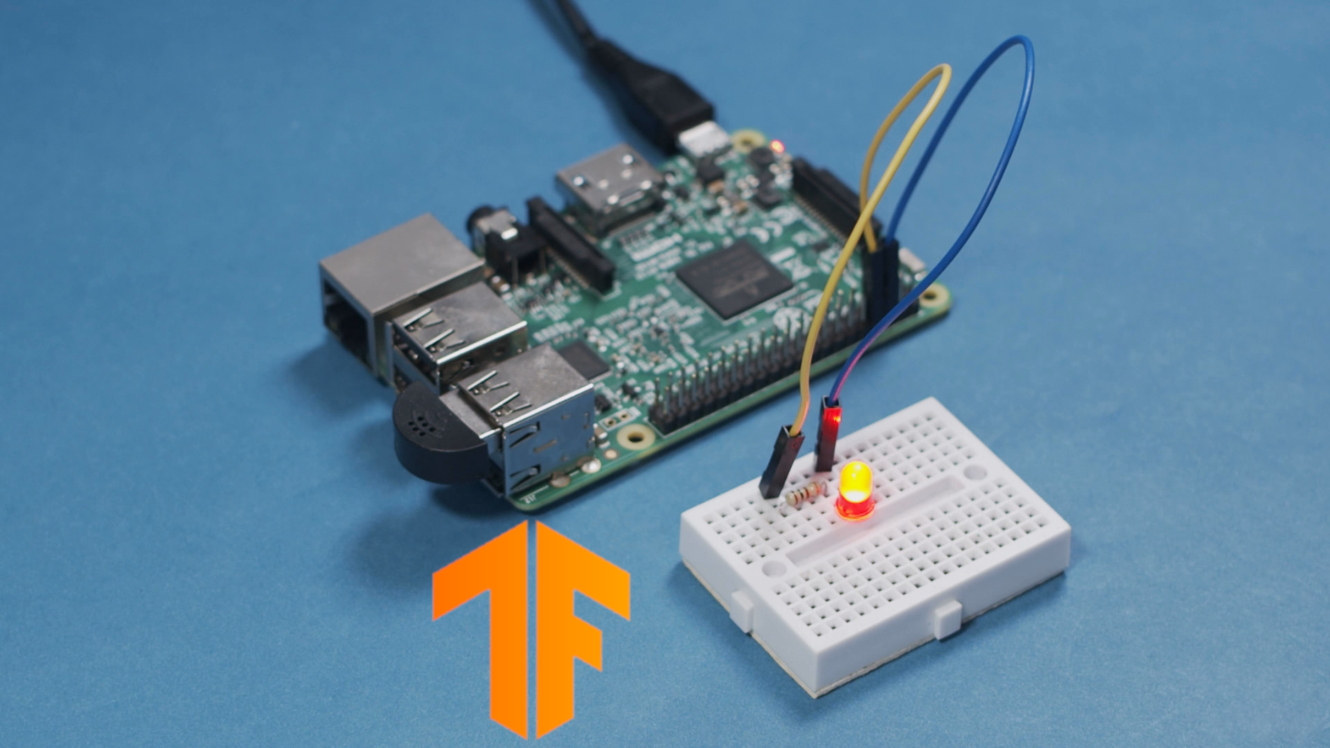 Raspberry Pi with LED and TensorFlow logo