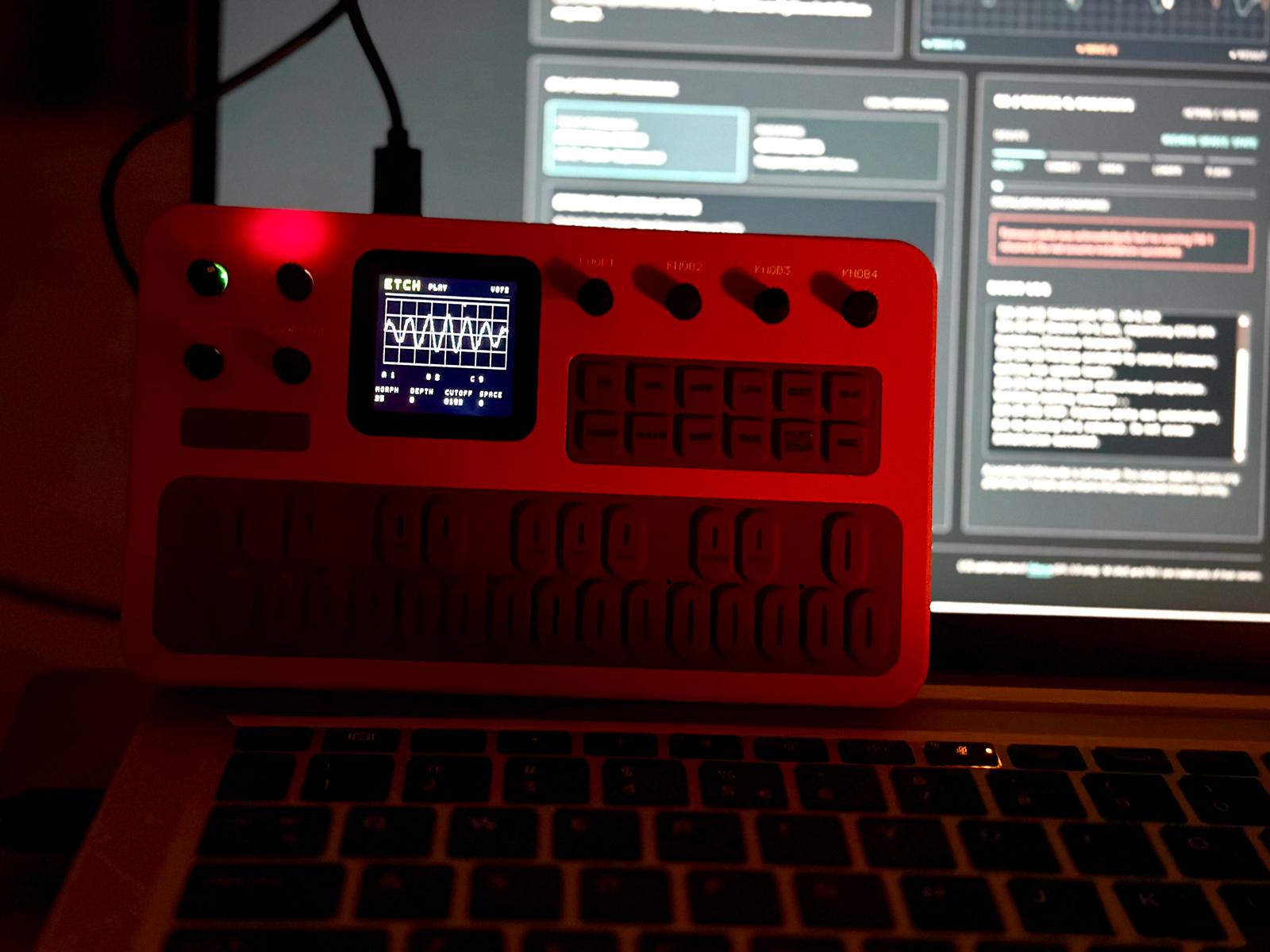 FM-1 running ETCH, with a wavetable shape on its screen and the web tool open behind it