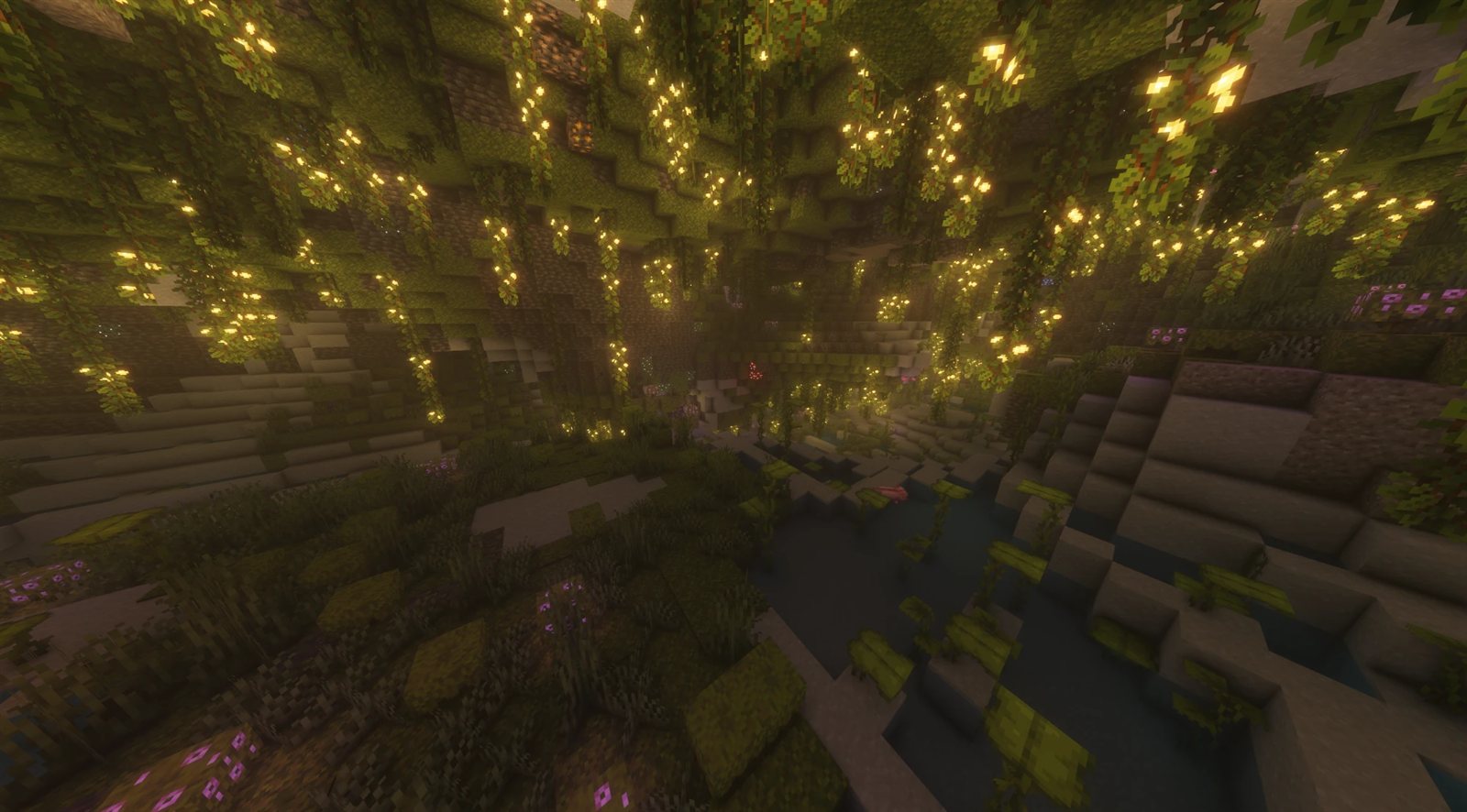 A lush cave lit by glow berries