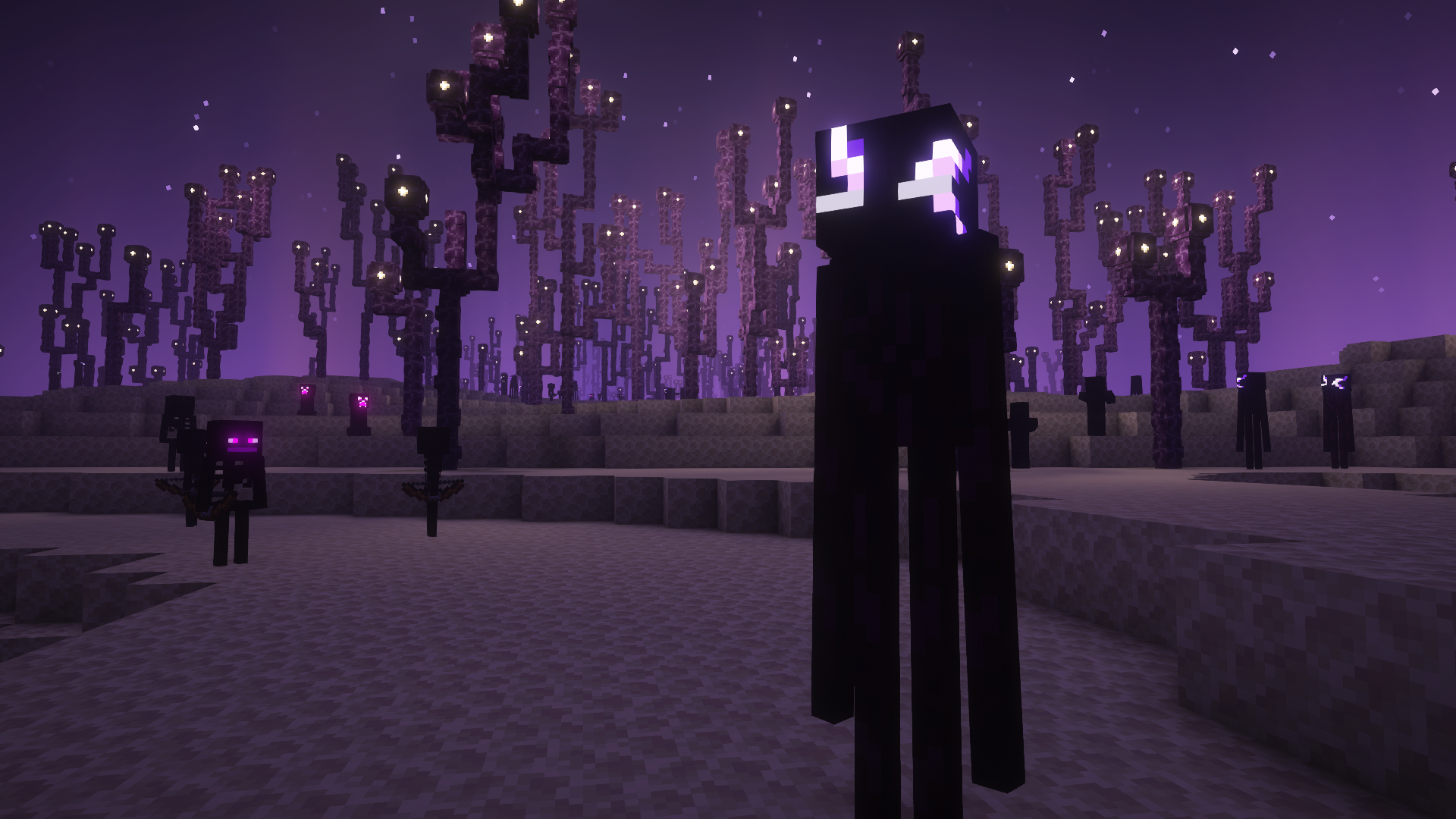 An enderman assassin walks in the foreground, with two endermen behind as well as an Ender Zombie.