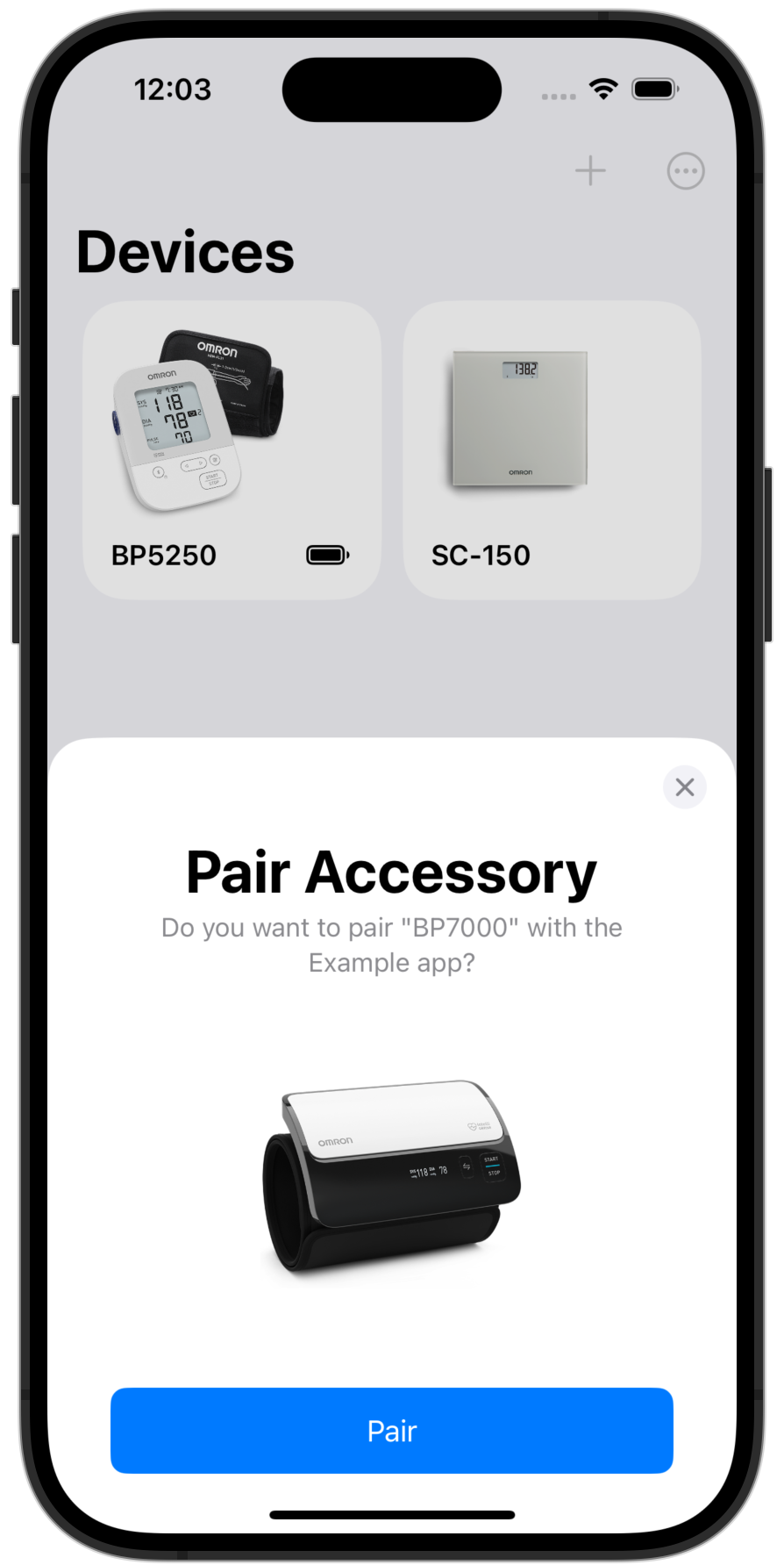 Screenshot showing paired devices in a grid layout. A sheet is presented in the foreground showing a nearby devices able to pair.