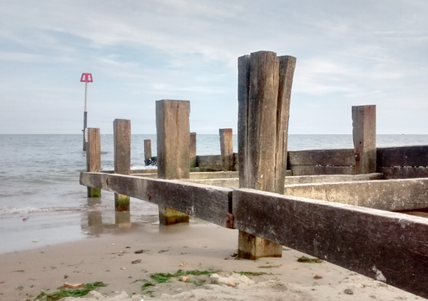 Photo of breakwaters on a beach