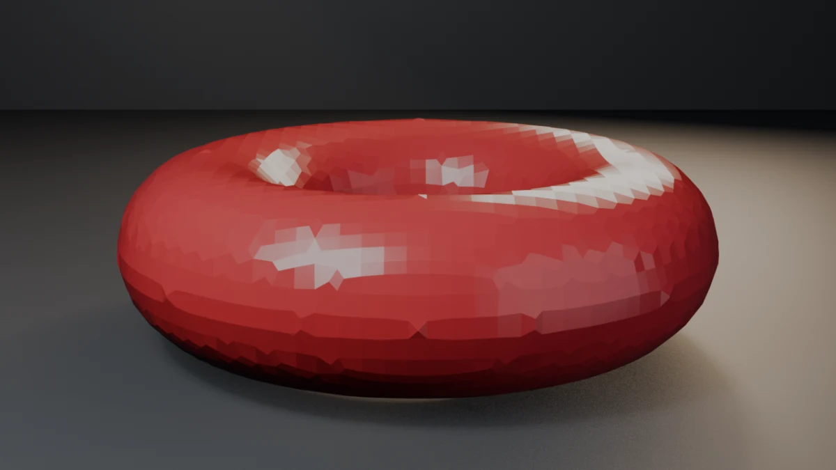 Geometry Nodes SDF remesh: a crimson ceramic torus with visible voxel-remesh facets, resting on a dark studio floor