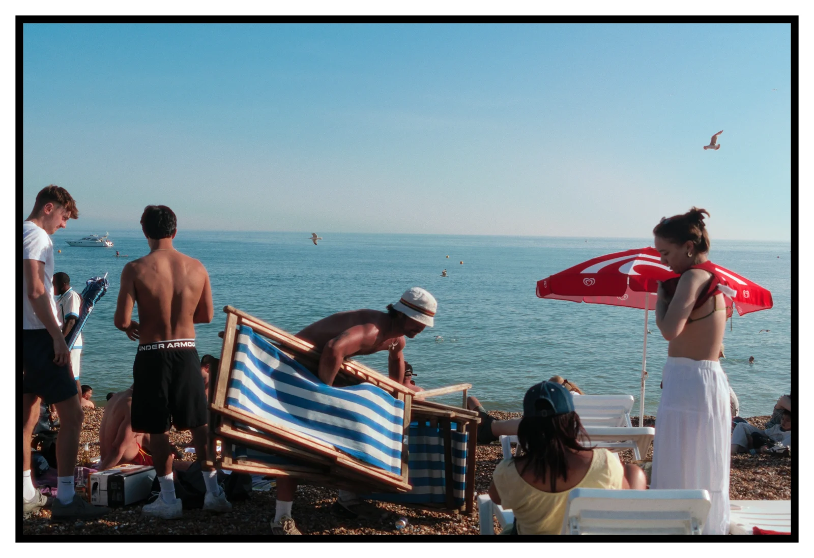 A beach photograph, finished in Chromasmith with a film look, grain, halation and a double film frame