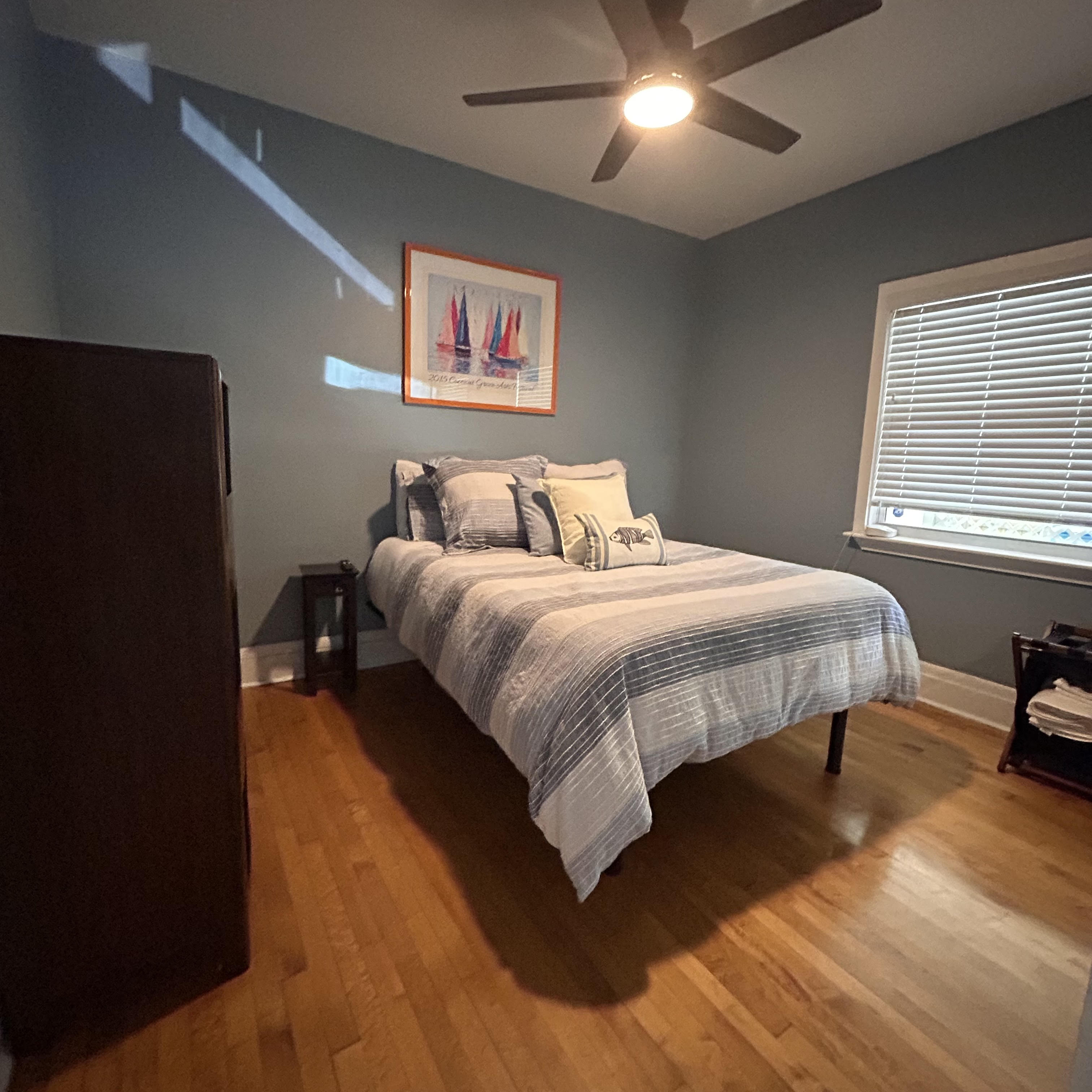 Second bedroom with queen bed and coastal decor