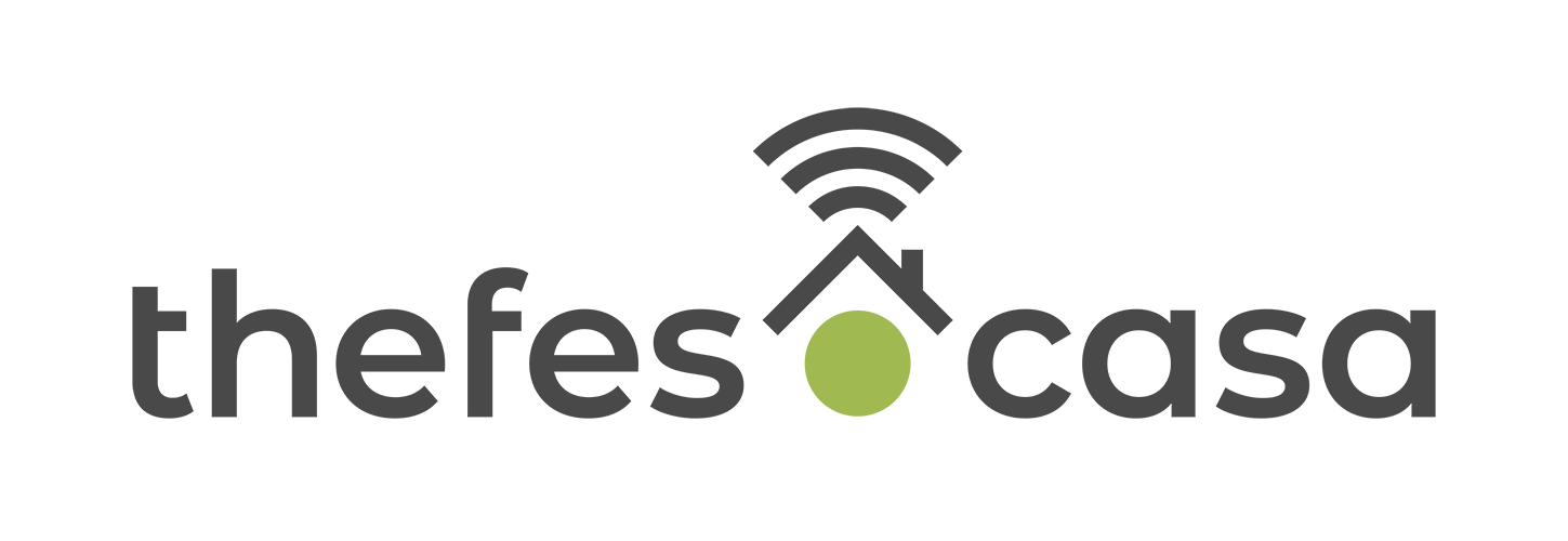 Shows a black logo in light color mode and a white one in dark color mode.