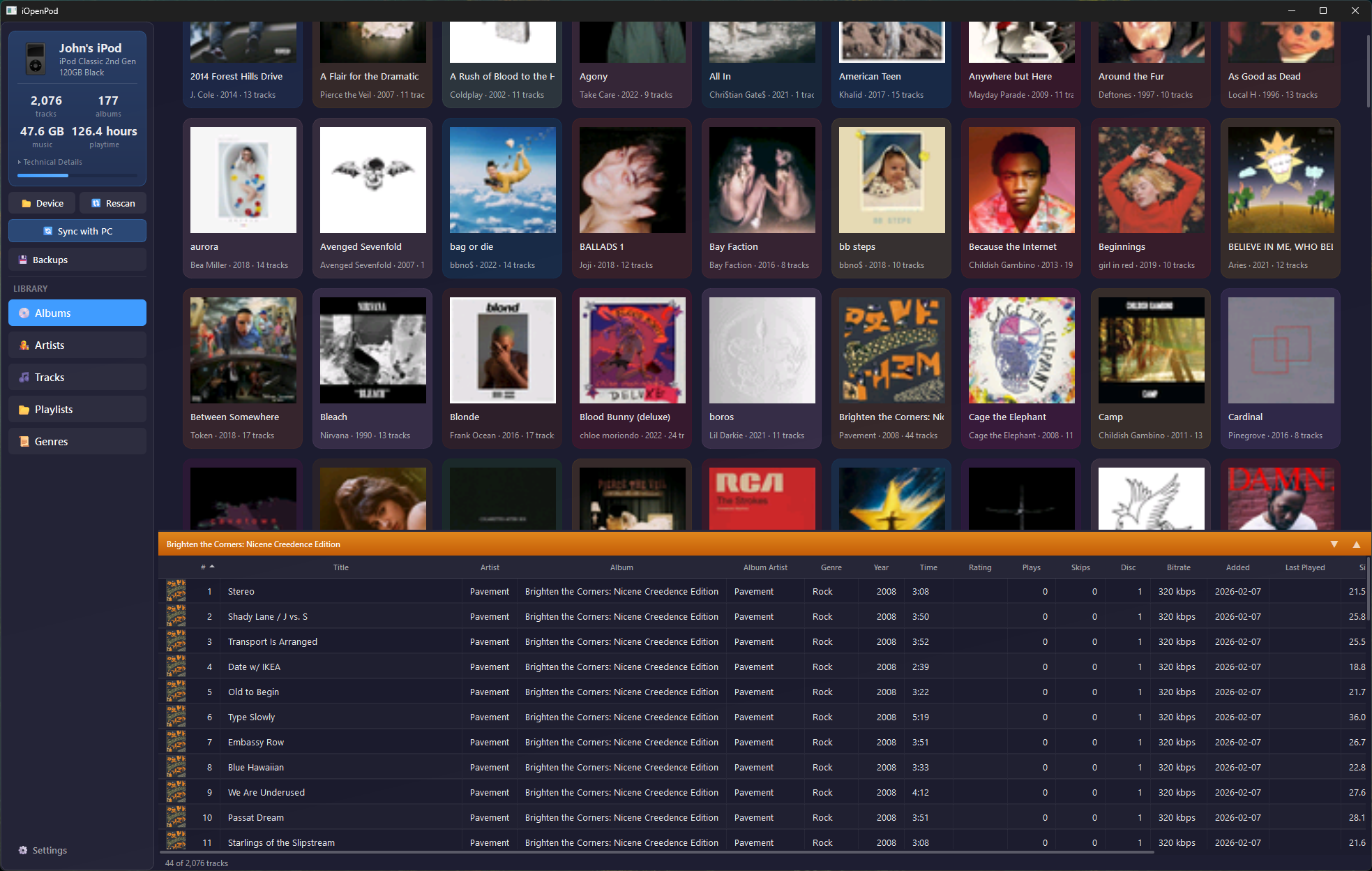 iOpenPod — open source iPod Classic sync tool showing album grid with artwork on Windows