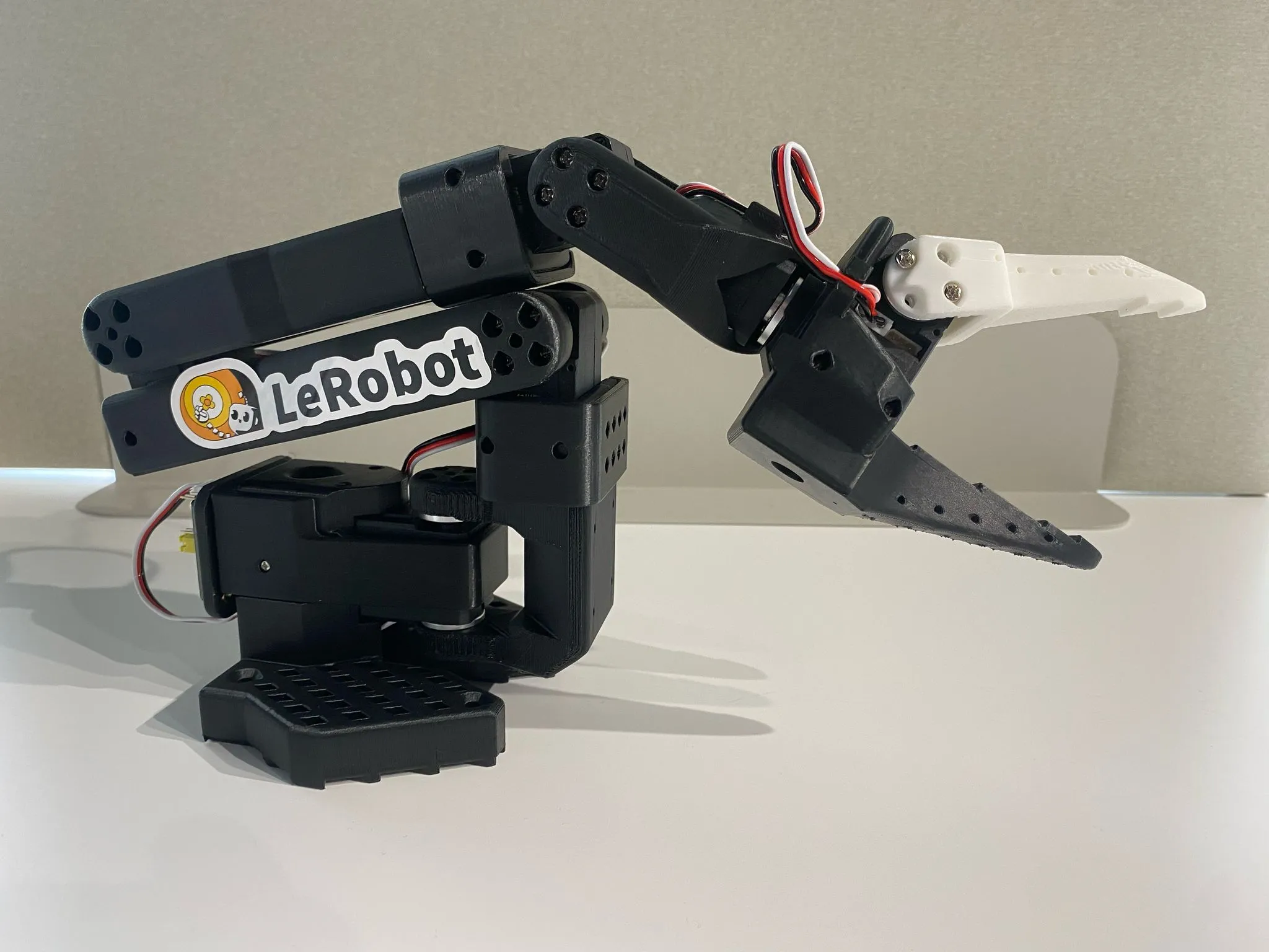 The SO-101 follower robot arm with its two-jaw gripper.