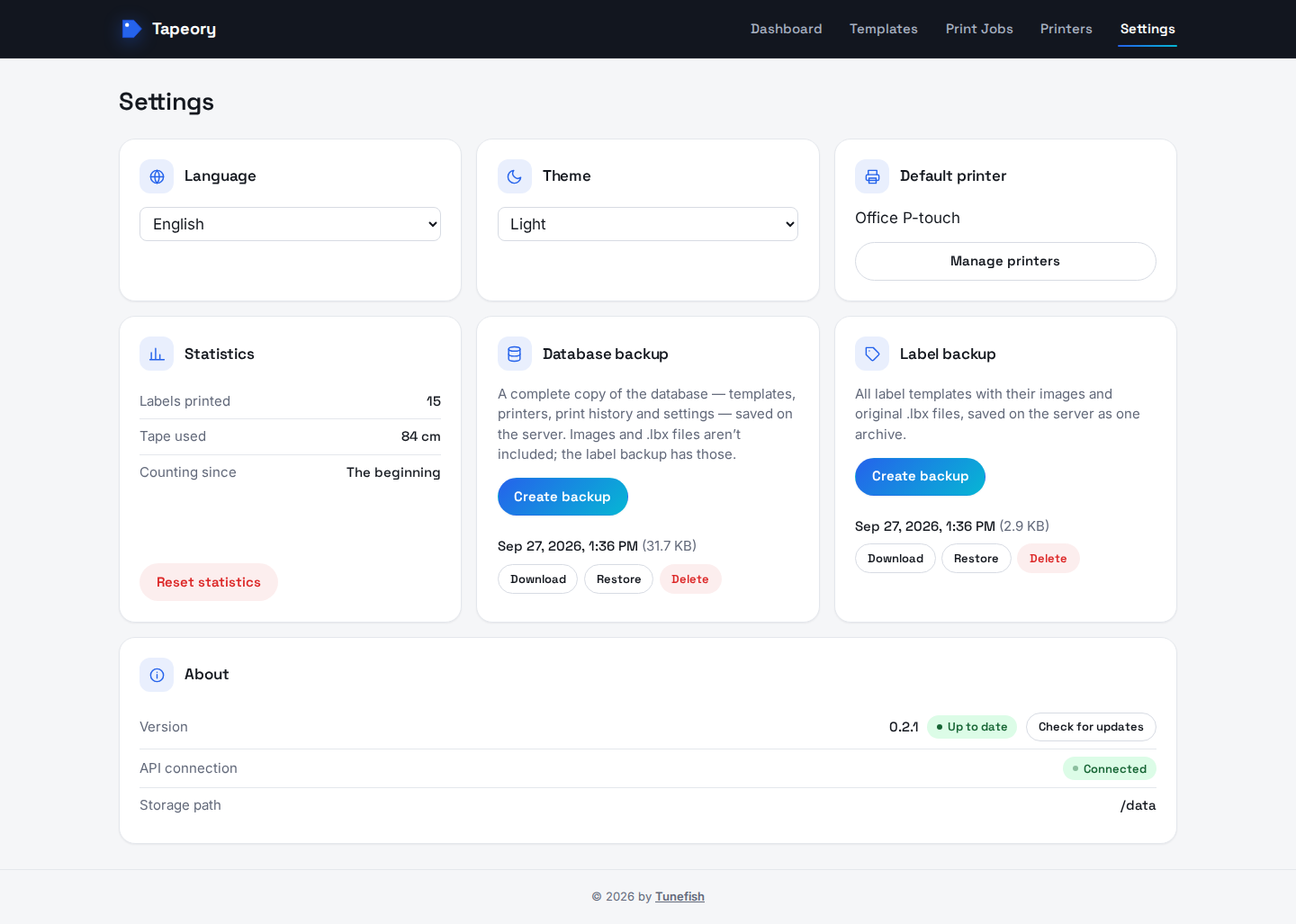 Settings page with the database and label backup cards