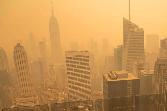 Midtown Manhattan skyline in orange wildfire smoke, June 7, 2023