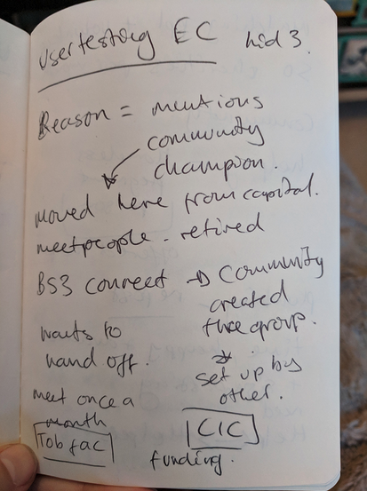 a photo of English handwritten notes from user research in a notebook