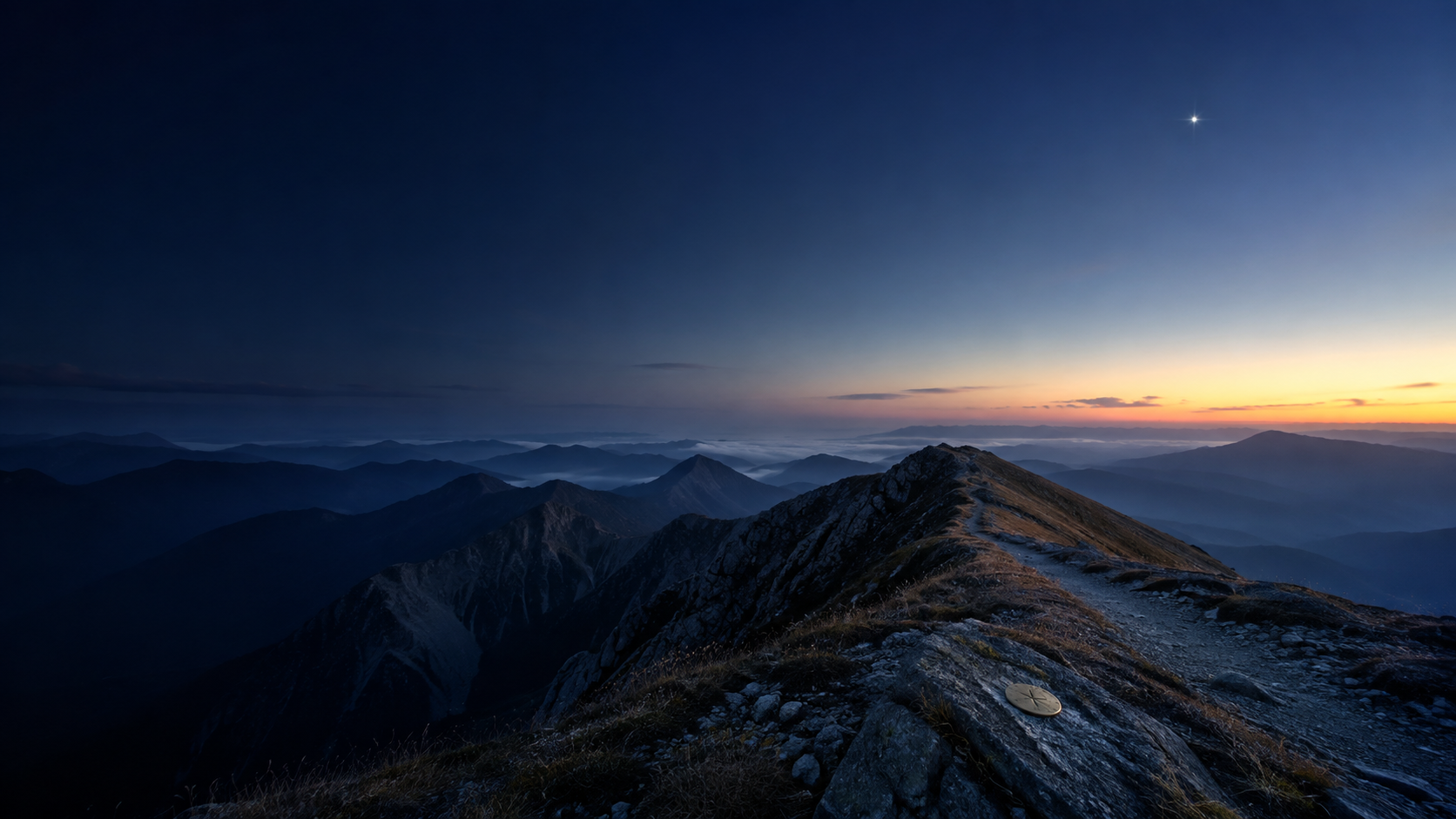 A mountain trail at dawn beneath a guiding star